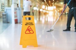 Wet floor sign in hallway