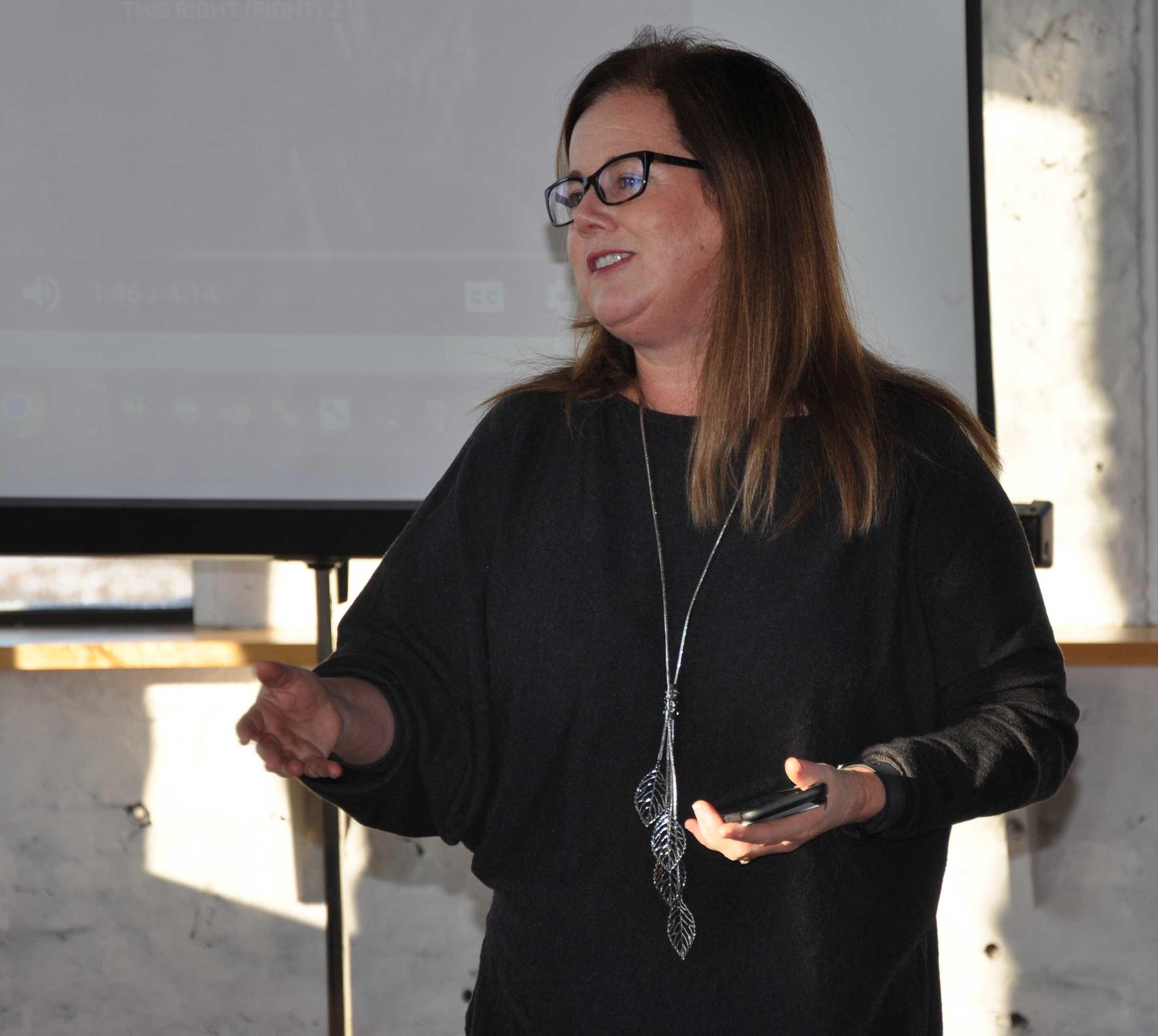 Jennifer with students